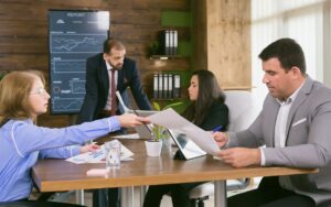 Outsourced Compliance Officer vs In-house Pros & Cons for Businesses in ADGM and DIFC